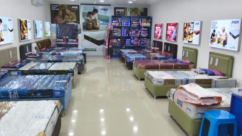 The centre aisle, with mattresses on both sides and the pillow wall at the back