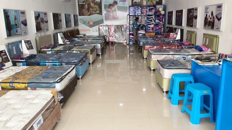 Mattresses, headboards and pillow shelves across the showroom