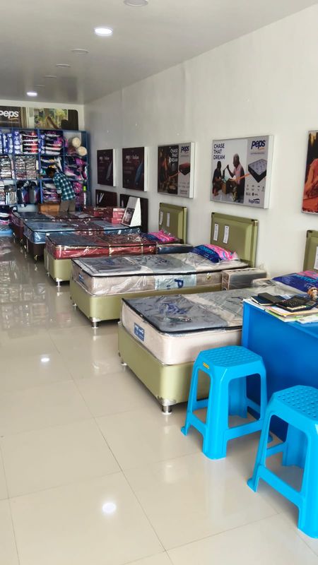 Display beds and the pillow wall, seen from the billing counter